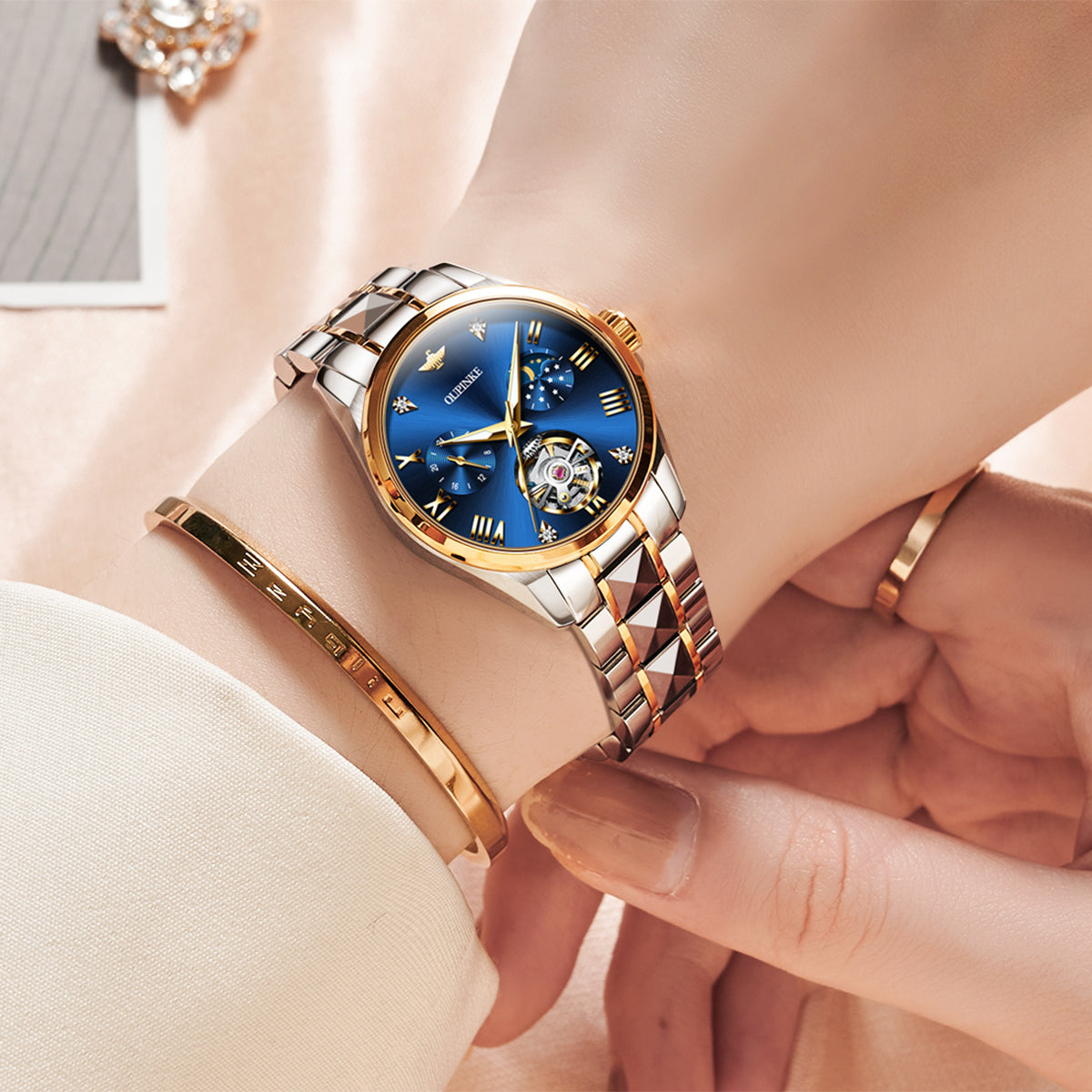 The Serpentine — Two-Tone Open-Heart Automatic · 32 mm